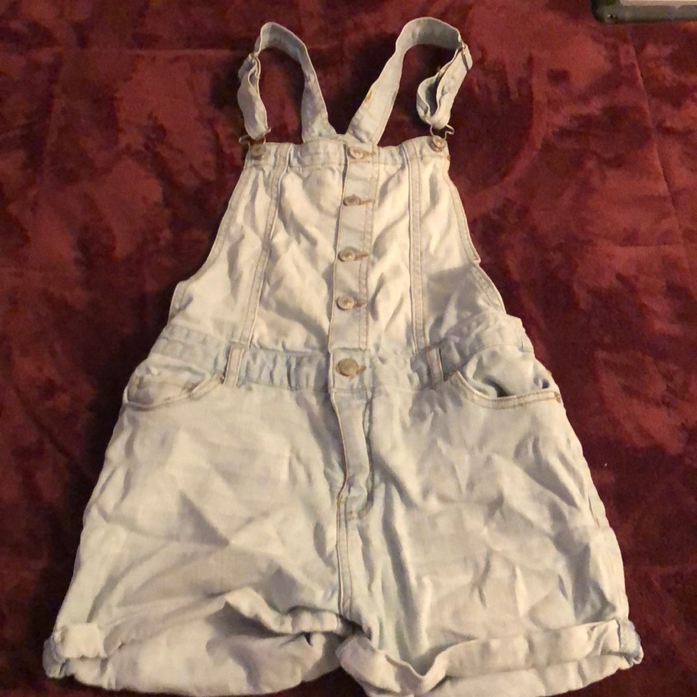 Light blue overalls with adjustable straps